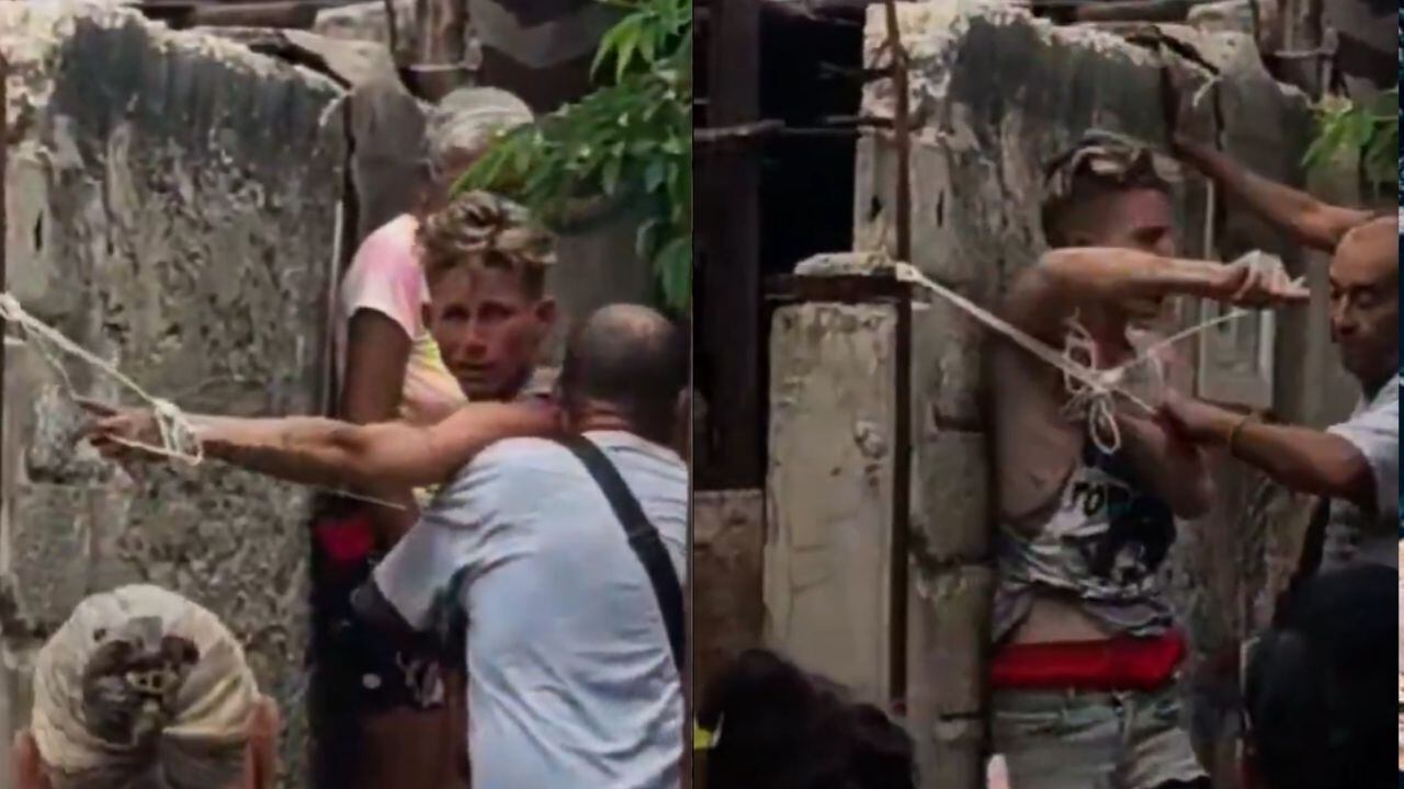 VIDEO: Captan brutal golpiza contra ladrón atrapado y amarrado a una reja por vecinos